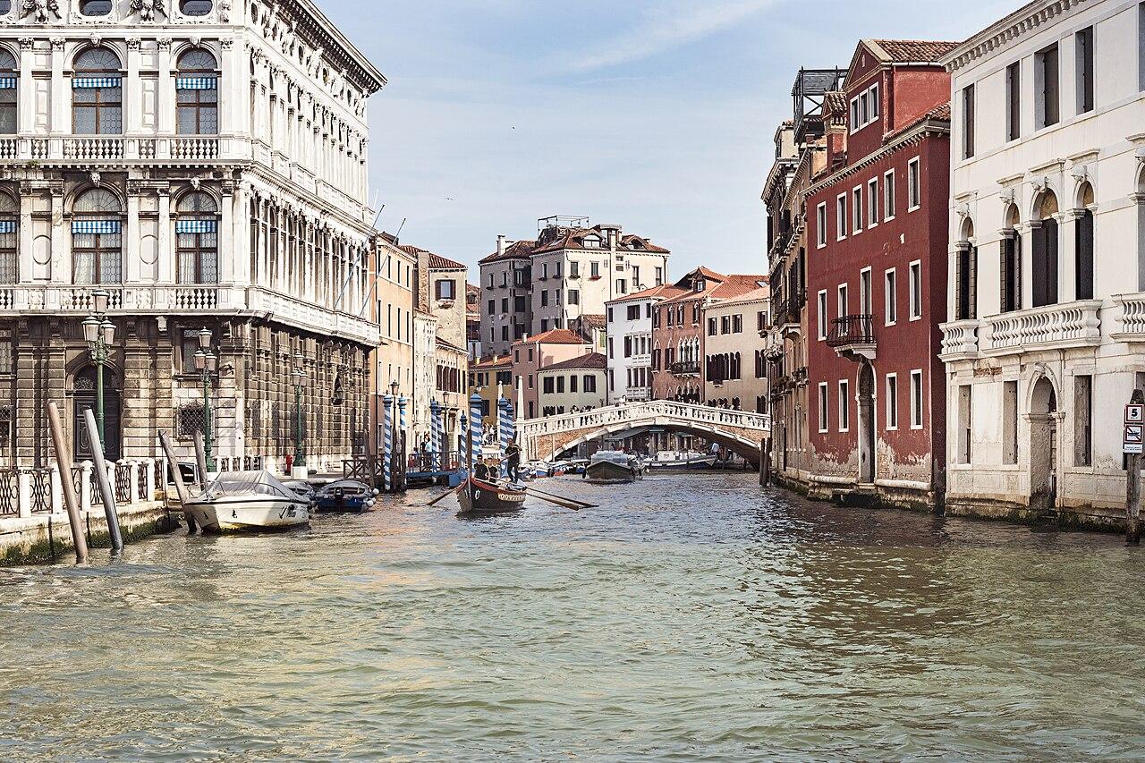 The Cannaregio canal in Venice, viewed from the Grand Canal toward a stone bridge